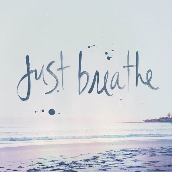 just breathe text over the beach