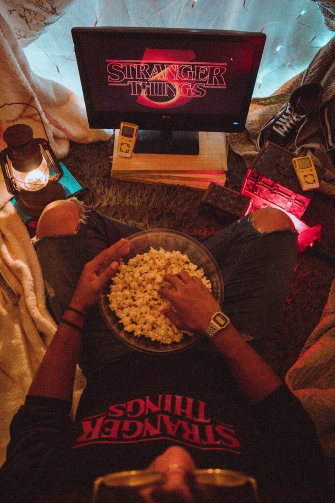 man eating popcorn